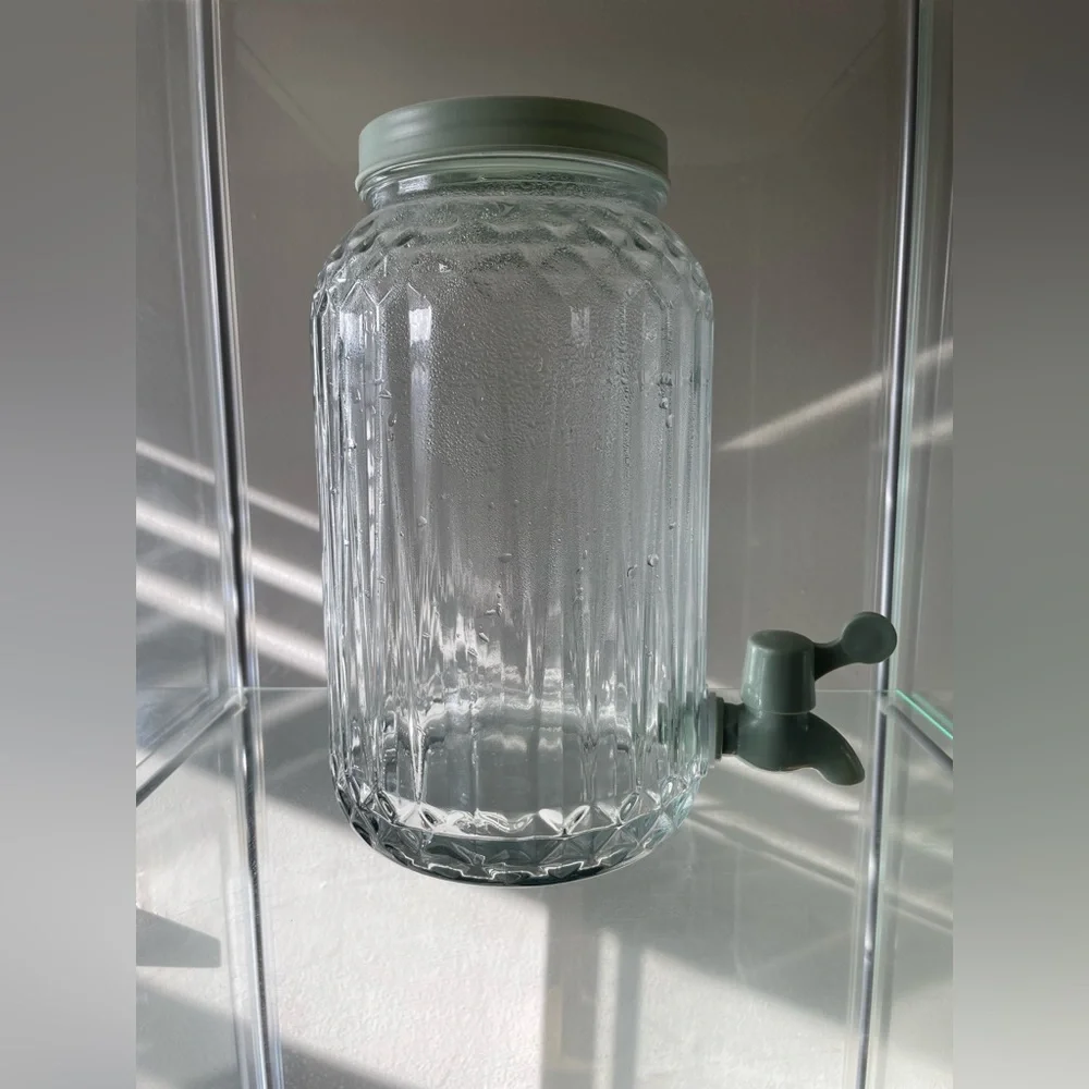 IKEA Clear Glass Beverage Dispenser with Green Lid and Spout